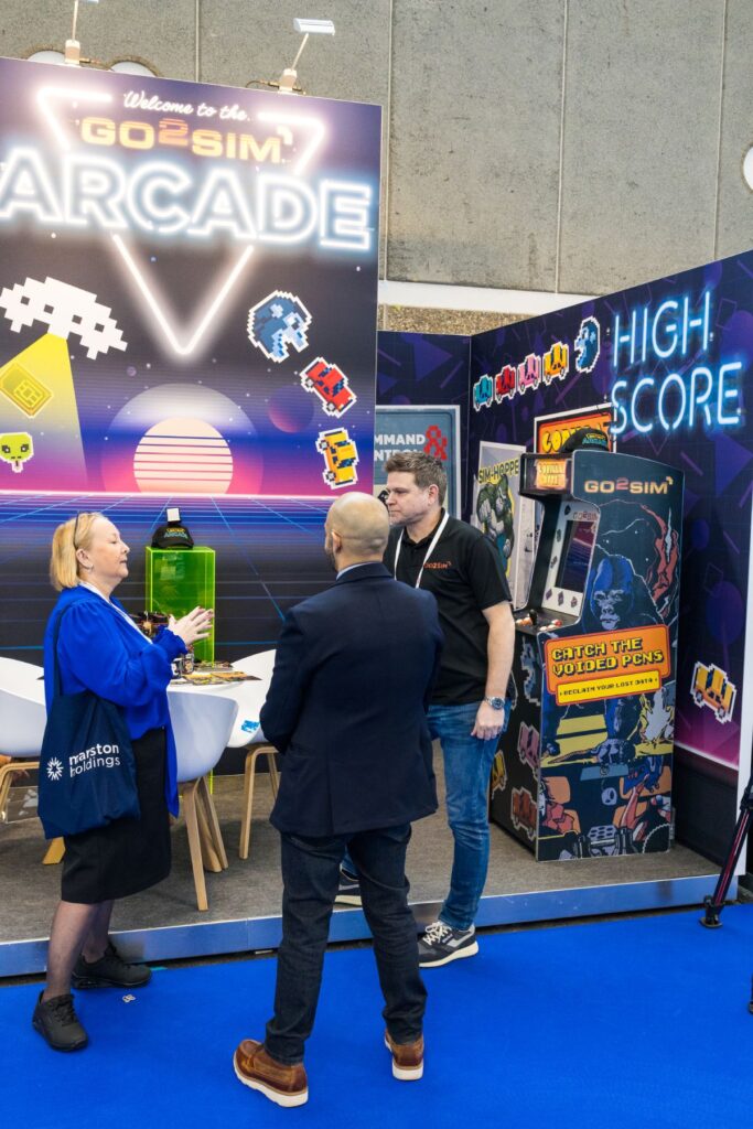 Simon and Hiran talking to a customer