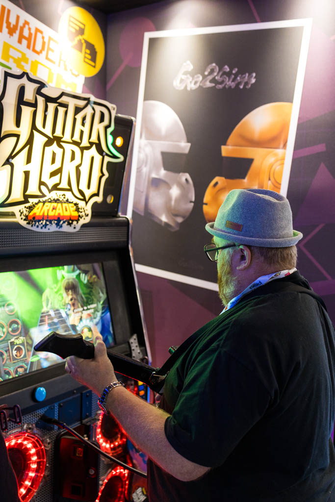 Simon playing guitar hero